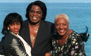 James Brown (centre) with Helen Fitzald and Martha High